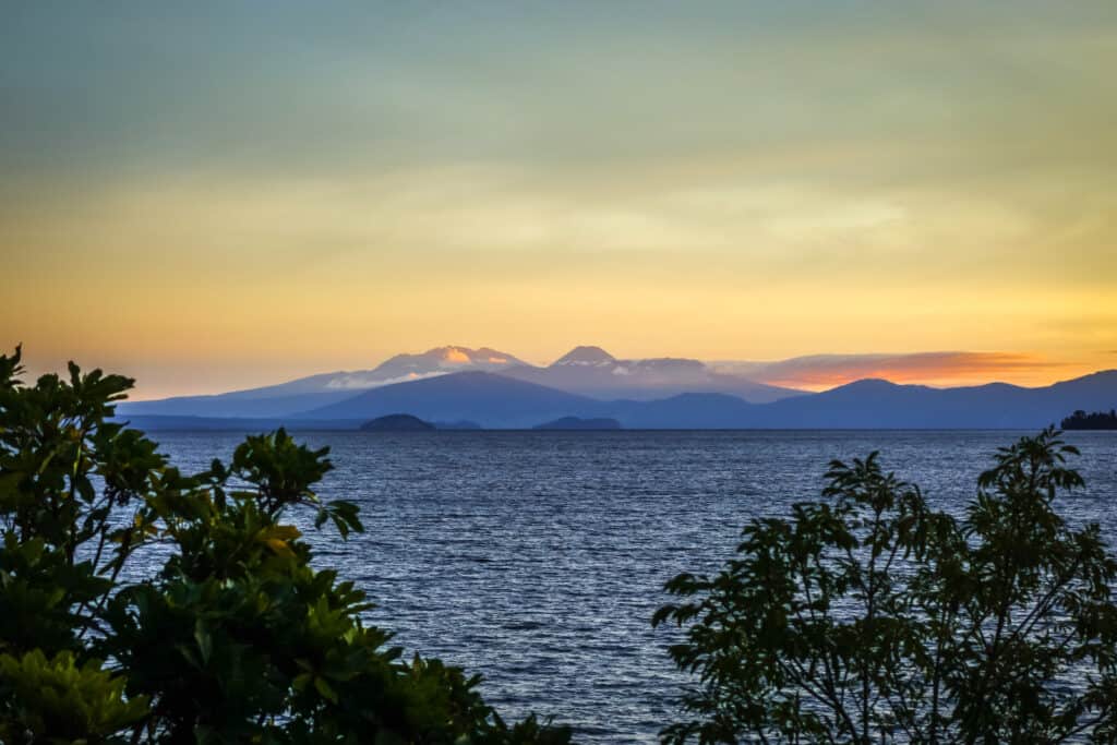 Taupo Lake and Tongariro volcano landscape at sunset, New Zealand