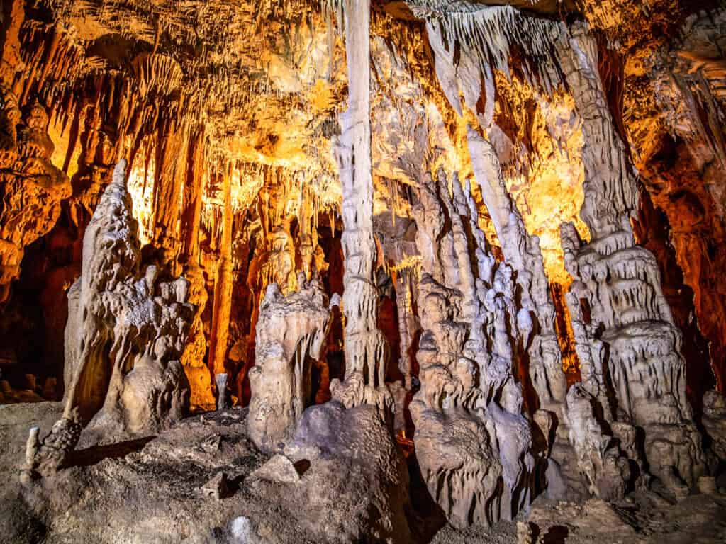 Close up of big dropstones. Inside cave scene