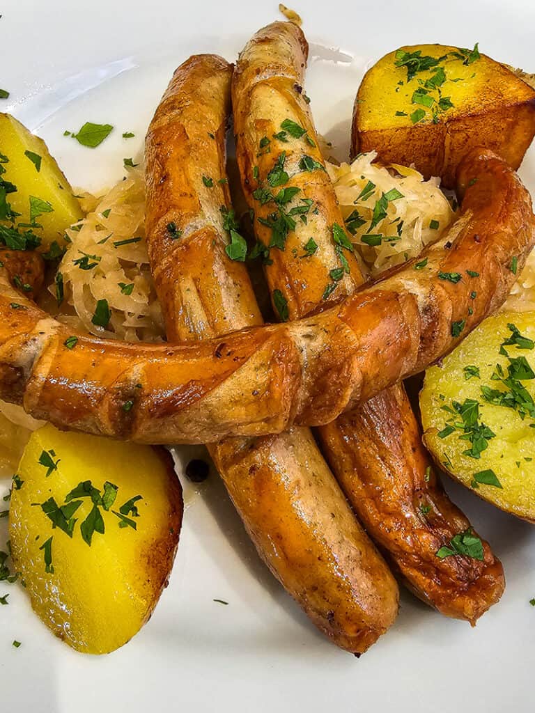 sasauge and potatoes on plate