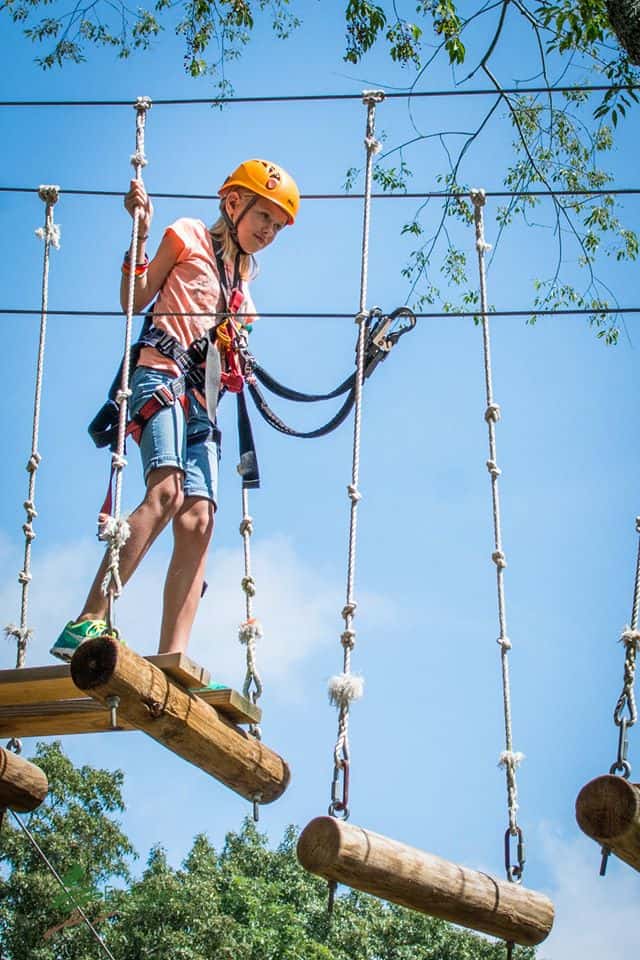 girl on high ropes course